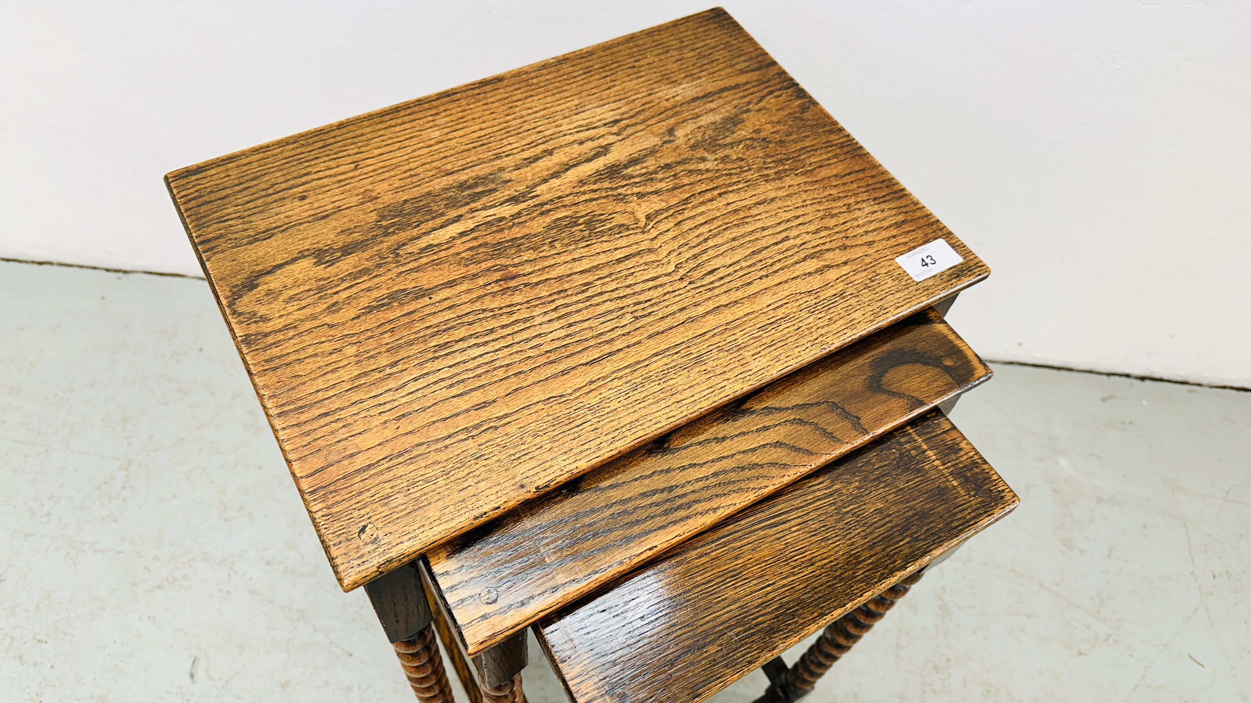 A NEXT TO 3 GRADUATED OCCASIONAL TABLES ON BOBBIN TURNED SUPPORTS - H 55CM X W 42CM X D 30CM. - Image 3 of 9