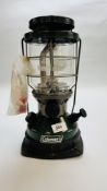 A COLEMAN "NORTH STAR" DUAL FUEL FISHING / CAMPING LANTERN PLUS TWO SPARE MANTELS.