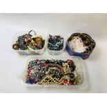 AN EXTENSIVE GROUP OF ASSORTED COSTUME JEWELLERY TO INCLUDE BEADS AND BANGLES ETC.