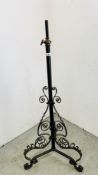 A VINTAGE WROUGHT IRON TELESCOPIC LAMP WITH VINTAGE FRINGE SHADE - WIRING AND BULB FITTING REMOVED.