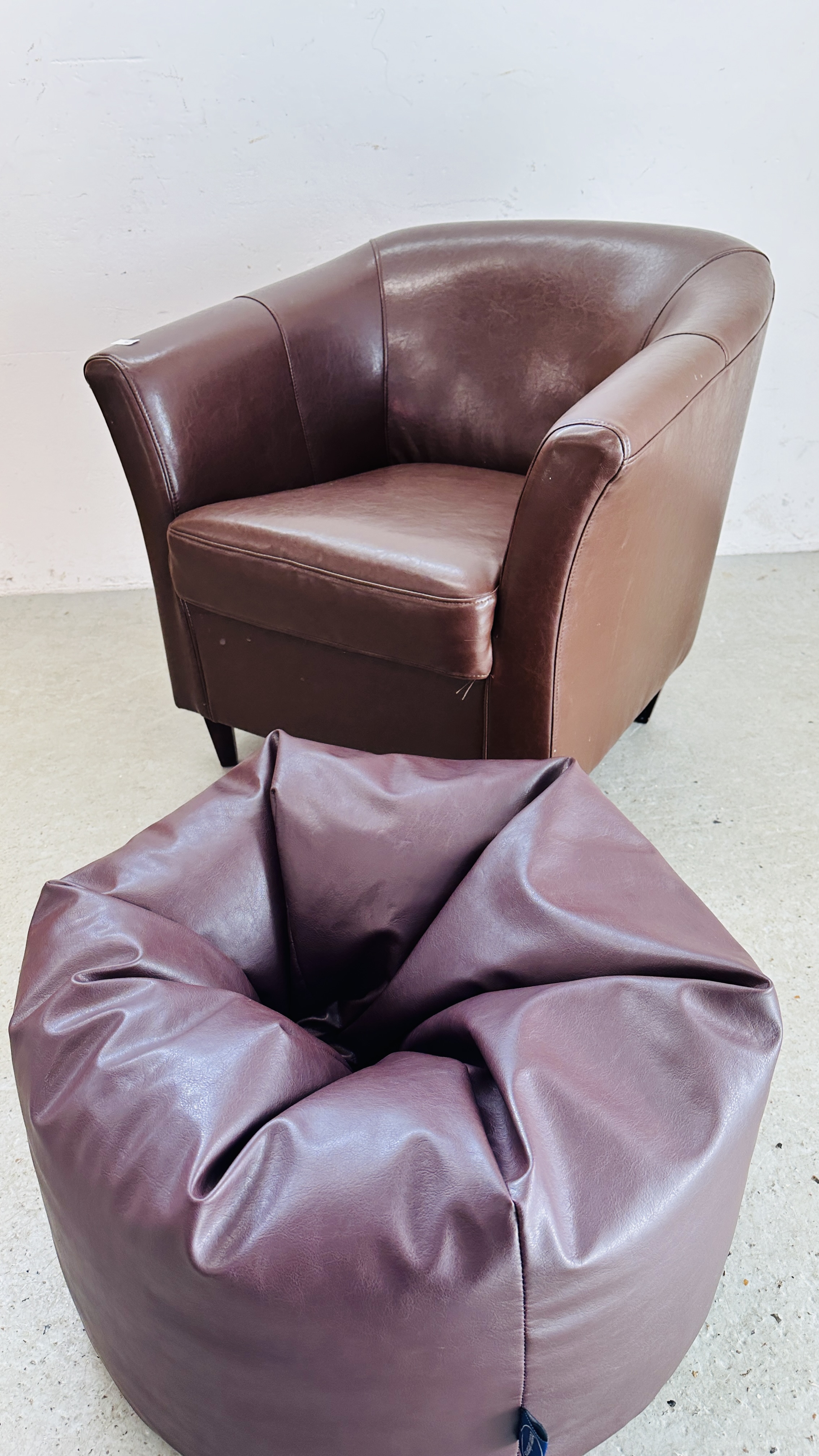 A MODERN BROWN FAUX LEATHER TUB CHAIR ALONG WITH MATCHING BEAN BAG FOOT REST. - Image 10 of 11