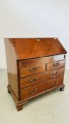 A GEORGE II RED WALNUT FALL-FRONT BUREAU, THE FITTED INTERIOR INCLUDING A WELL,