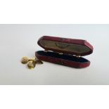 A CASED SET OF VINTAGE GILT METAL STUDS IN ORIGINAL FITTED CASE MARKED W.