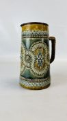 AN ANTIQUE DOULTON LAMBETH STONEWARE JUG INITIALED TO BASE HH DATED 1884 H 23CM.