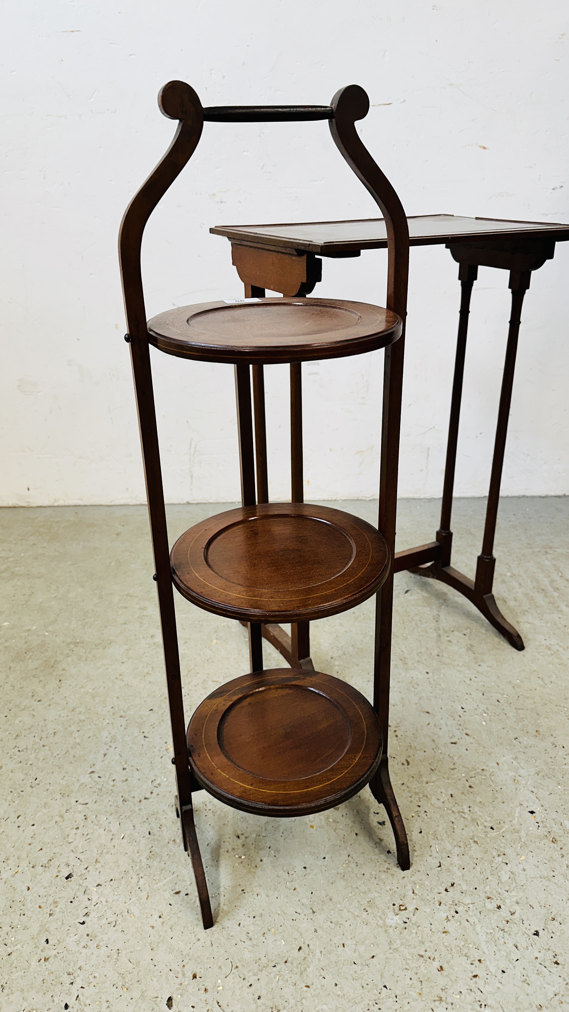 A FOLDING CAKE STAND ALONG WITH MAHOGNY OCCASIONAL TABLE, ONE OF A QUATTETO SET.
