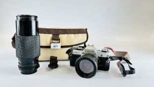 CANON AE-1 FITTED WITH 50MM 1:18 LENS ALONG WITH CANON FD 70-210 1:4 LENS IN PADDED CARRY CASE.