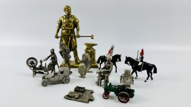 A BRASS STUDY OF A BLACKSMITH ALONG WITH VARIOUS CAST FIGURES AND CABINET COLLECTIBLES.