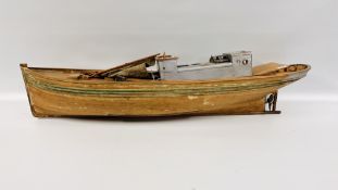 A HANDCRAFTED WOODEN MODEL BOAT L 116CM.