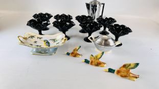 A SET OF EIGHT FLUTED COLOURED GLASS FRUIT DISHES AND A SET OF FLYING DUCKS,