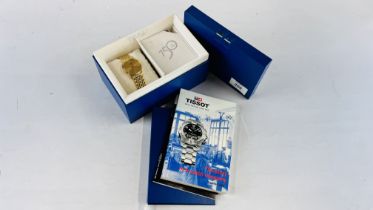 A GENT'S TISSOT WRIST WATCH IN ORIGINAL DISPLAY BOX WITH USER MANUAL AND WARRANTY.