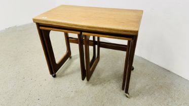 FURNITURE BY MCINTOSH TRIFORM NEST OF THREE RETRO TEAK FINISH OCCASIONAL TABLES,