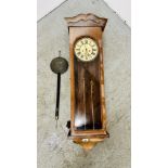 AN ANTIQUE MAHOGANY CASED VIENNA WALL CLOCK AND PENDULUM. H 106CM.