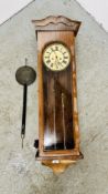 AN ANTIQUE MAHOGANY CASED VIENNA WALL CLOCK AND PENDULUM. H 106CM.