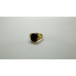 A 9CT GOLD SIGNET RING INSET WITH A TIGER'S EYE PANEL, BIRMINGHAM ASSAY.