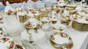 AN EXTENSIVE COLLECTION OF ROYAL ALBERT "OLD COUNTRY ROSE" DESIGN TABLE WARES TO INCLUDE DINNER AND