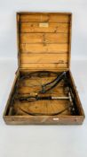 A VINTAGE WOODEN CASED MEASURING WHEEL MANUFACTURED BY W.F. STANLEY & Co.