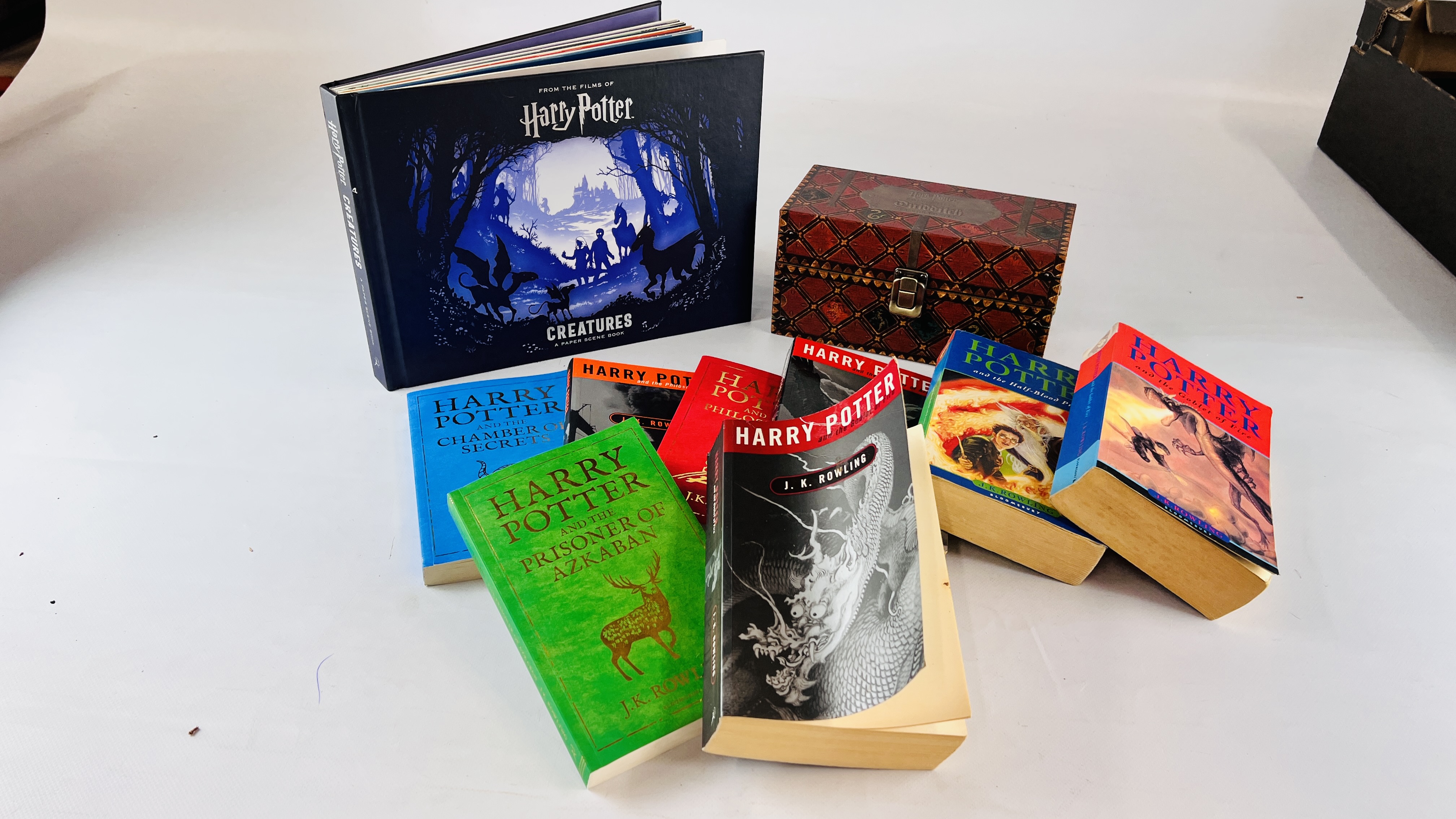 COLLECTION OF HARRY POTTER BOOKS TO INCLUDE FIRST EDITIONS, PAPERBACKS, HARRY POTTER CREATURES ETC.