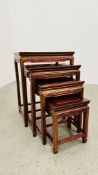 A SET OF 4 ORIENTAL HARDWOOD NEST OF TABLES - 61CM W X 36CM D X 66CM H.