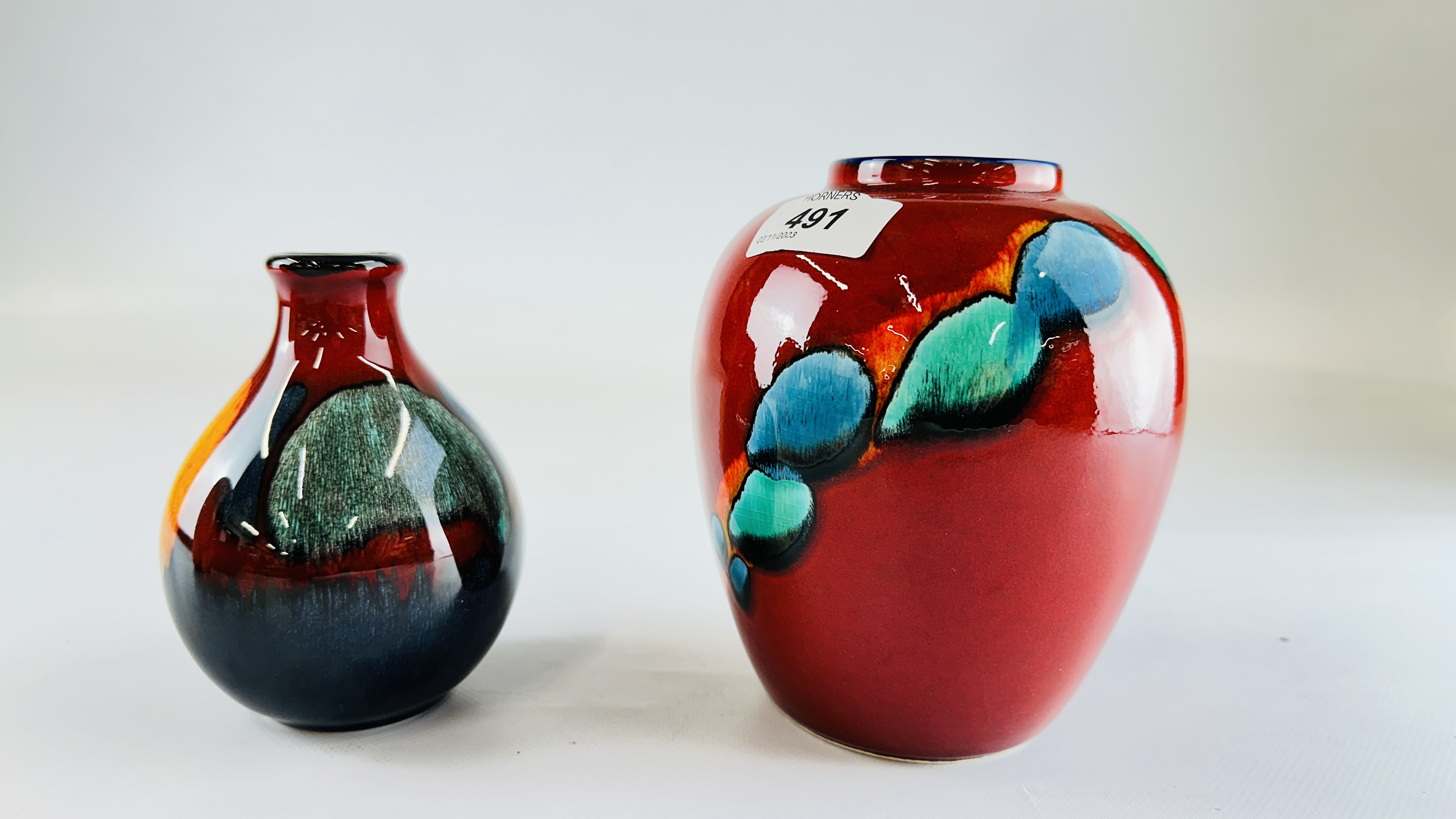 TWO POOLE POTTERY "LIVING GLAZE" VASES TO INCLUDE A VOLCANO EXAMPLE H 15CM.
