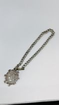 A VINTAGE SILVER WATCH CHAIN AND ATTACHED PENDANT.