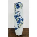 A LARGE PORCELAIN CHINESE STYLED STICK / UMBRELLA STAND - HEIGHT 70CM.