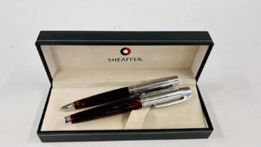 A "SHEAFFER" BOXED PEN DUO ALONG WITH USE AND CAR GUIDE.