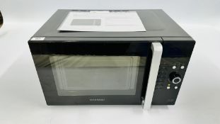 DAEWOO BLACK FINISH MICROWAVE - SOLD AS SEEN.