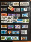 STAMPS: TWO VOLUMES WITH GB MINT COMMEMORATIVES INCLUDING DECIMAL ISSUES TO 1998, GUTTER PAIRS ETC.