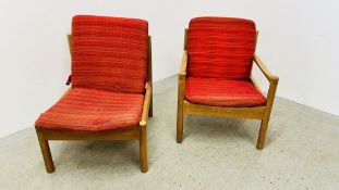 TWO RETRO ERCOL EASY CHAIRS (MODEL NUMBERS 747, 749) ONE WITH ARMS ONE WITHOUT.