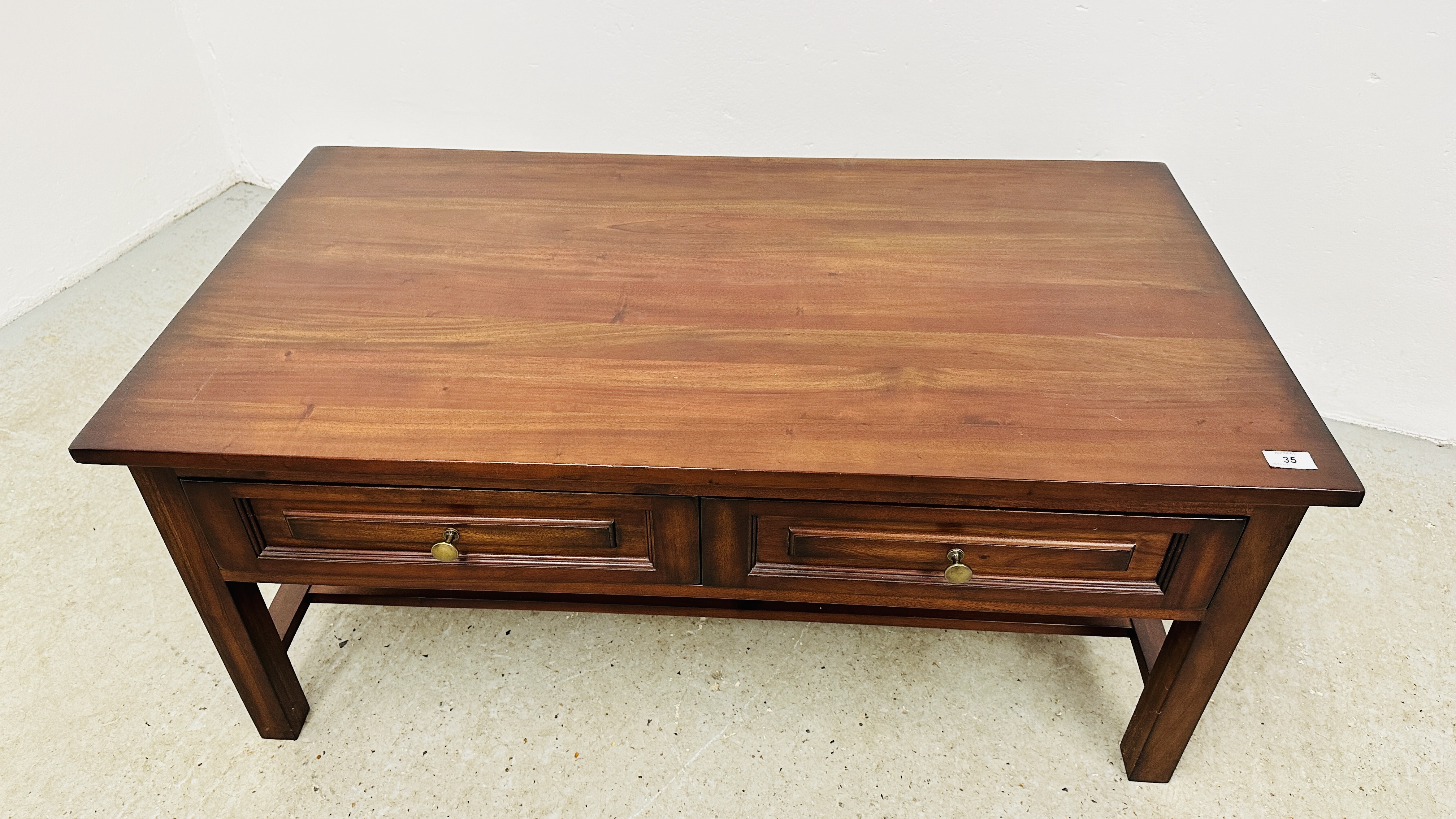 A DARK WOOD TWO DRAWER RECTANGULAR COFFEE TABLE - 110CM X 60CM. - Image 2 of 9