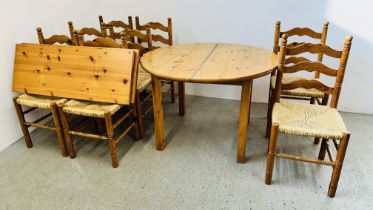 SOLID PINE EXTENDING DINING TABLE AND SET OF EIGHT RUSH SEATED PINE FRAMED DINING CHAIRS (2