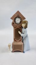 A NAO LLADRO ORNAMENT "GRANDFATHER CLOCK WITH LITTLE GIRL AND HER DOG" H 25.5CM.