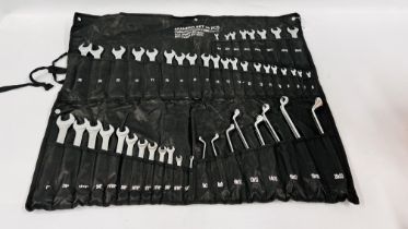 A 48 PIECE SPANNER SET IN CANVAS TIDY.