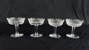 A SET OF FOUR WATERFORD "ALANA" CHAMPAGNE / SHERBET GLASSES.