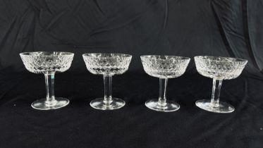 A SET OF FOUR WATERFORD "ALANA" CHAMPAGNE / SHERBET GLASSES.