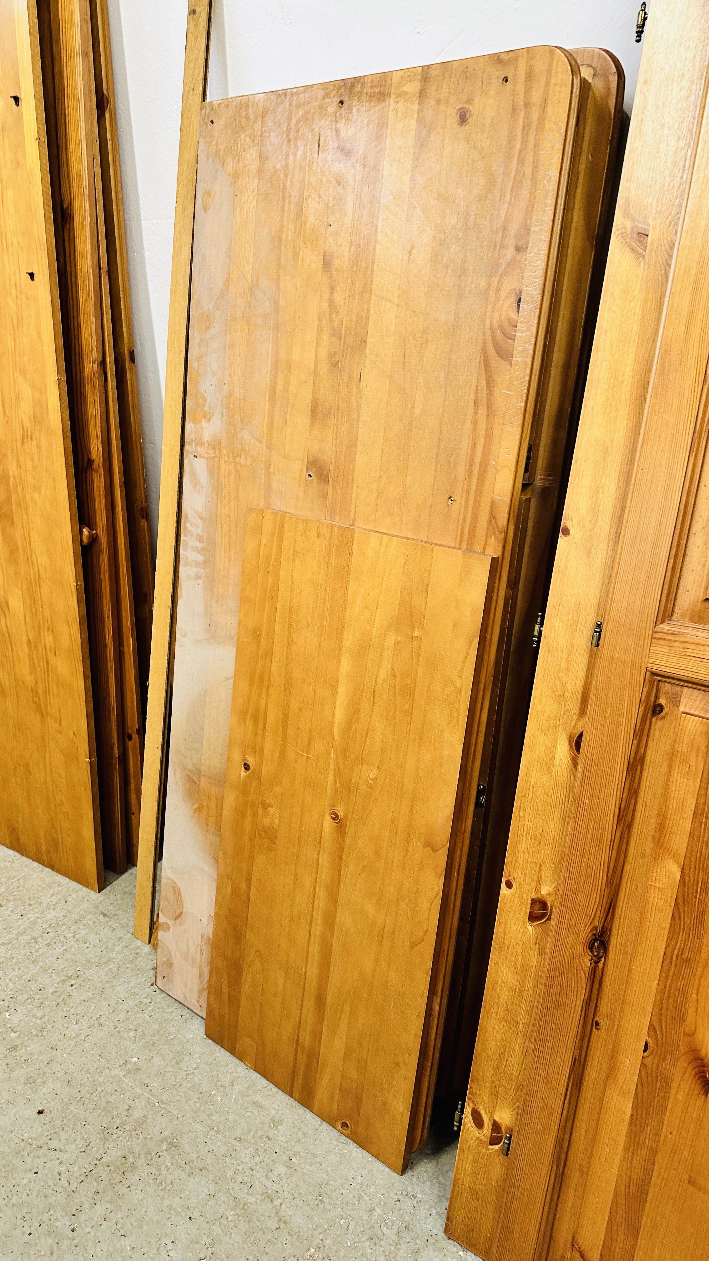 A HONEY PINE TWO DOOR WARDROBE AND A HONEY PINE TRIPLE WARDROBE (DISASSEMBLED). - Image 3 of 9