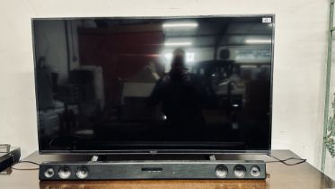 A HISENSE 50 INCH TV MODEL H50B7300UK ALONG WITH AN LG SOUND BAR MODEL LA526OB - SOLD AS SEEN.