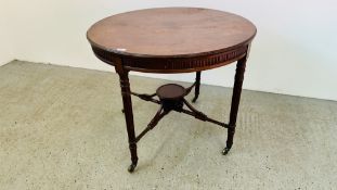 A CIRCULAR MAHOGANY TABLE ON REEDED SUPPORTS WITH LOWER CROSS STRETCHER AND CIRCULAR SUPPORT -