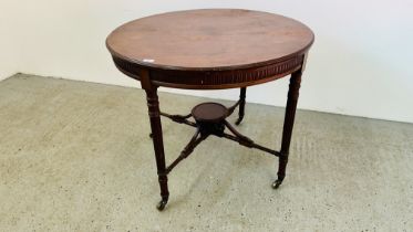 A CIRCULAR MAHOGANY TABLE ON REEDED SUPPORTS WITH LOWER CROSS STRETCHER AND CIRCULAR SUPPORT -