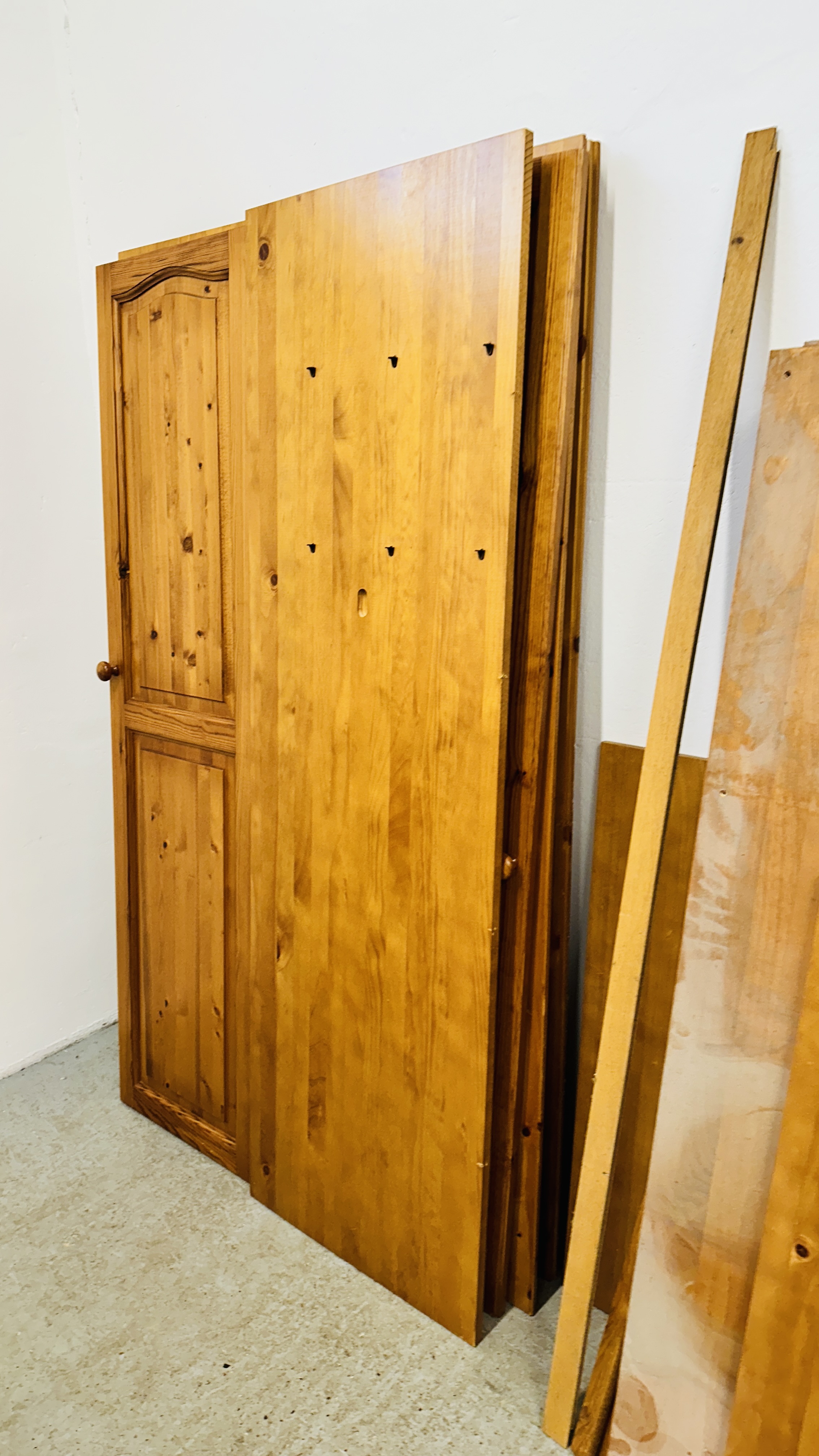 A HONEY PINE TWO DOOR WARDROBE AND A HONEY PINE TRIPLE WARDROBE (DISASSEMBLED). - Image 4 of 9