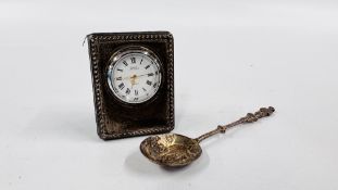 A VINTAGE SILVER CASED TRAVEL CLOCK MARKED "R. CARR" H 6.5CM X W 5CM ALONG WITH A SILVER GILT SPOON.