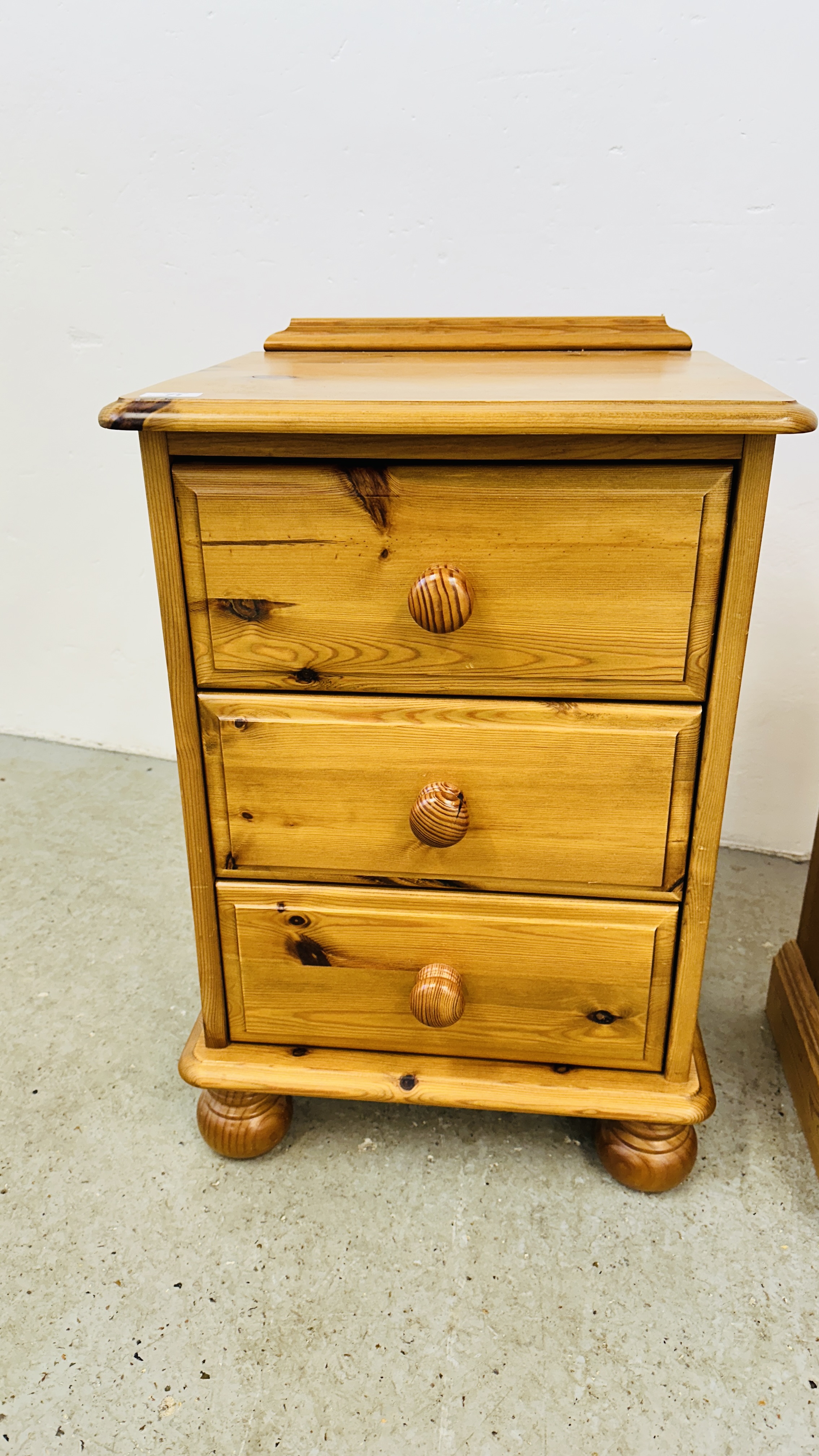 A HONEY PINE 3 DRAWER BEDSIDE CHEST ALONG WITH A FURTHER WAXED PINE EXAMPLE. - Image 6 of 7