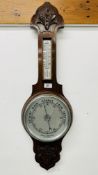 AN OAK MOUNTED ANAROID BAROMETER.