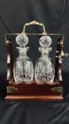 A WATERFORD CRYSTAL "LISMORE" TWO BOTTLE TANTALUS.