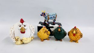 A GROUP OF MODERN DESIGNER STUDIO CHICKENS BY VICKI THOMAS ALONG WITH A COW PARADE 6005 COWER