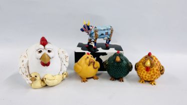 A GROUP OF MODERN DESIGNER STUDIO CHICKENS BY VICKI THOMAS ALONG WITH A COW PARADE 6005 COWER