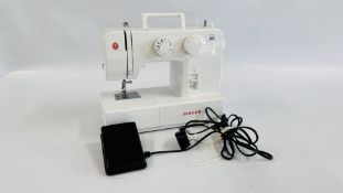 A SINGER PROMISE 1409 SEWING MACHINE WITH FOOT PEDAL - SOLD AS SEEN.