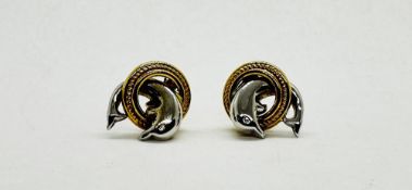 A PAIR OF 18CT YELLOW AND WHITE GOLD STUD EARRINGS "DOLPHINS THROUGH HOOPS.