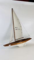 A RC WOODEN POND YACHT.