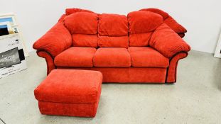 A MODERN RED UPHOLSTERED THREE PIECE LOUNGE SUITE WITH MATCHING FOOTSTOOL.
